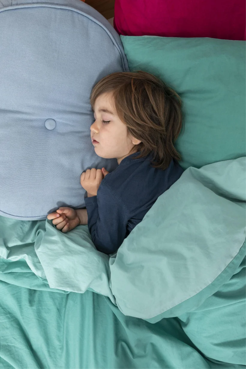 Fotografía de un niño durmiendo